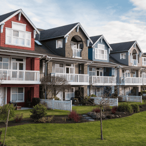 Multi-unit residential building in Virginia with balconies and landscaped yard.