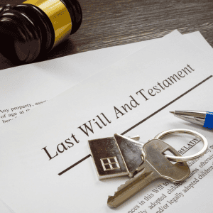 Legal document for estate planning with house key and gavel.